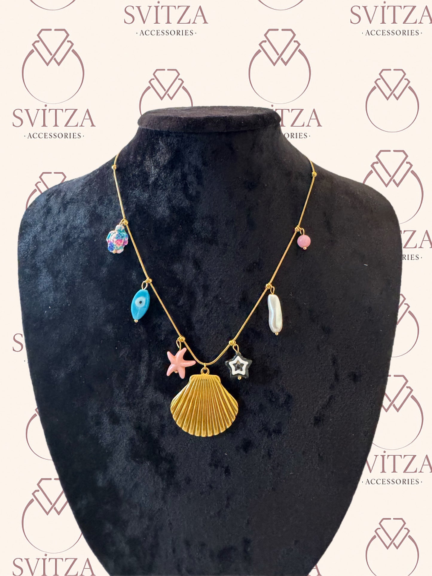 Svitza Accessories Altın Zincir Kolye – Deniz Temalı, Renkli Kabuk ve Yıldız Figürleri ile Zarif Tasarım